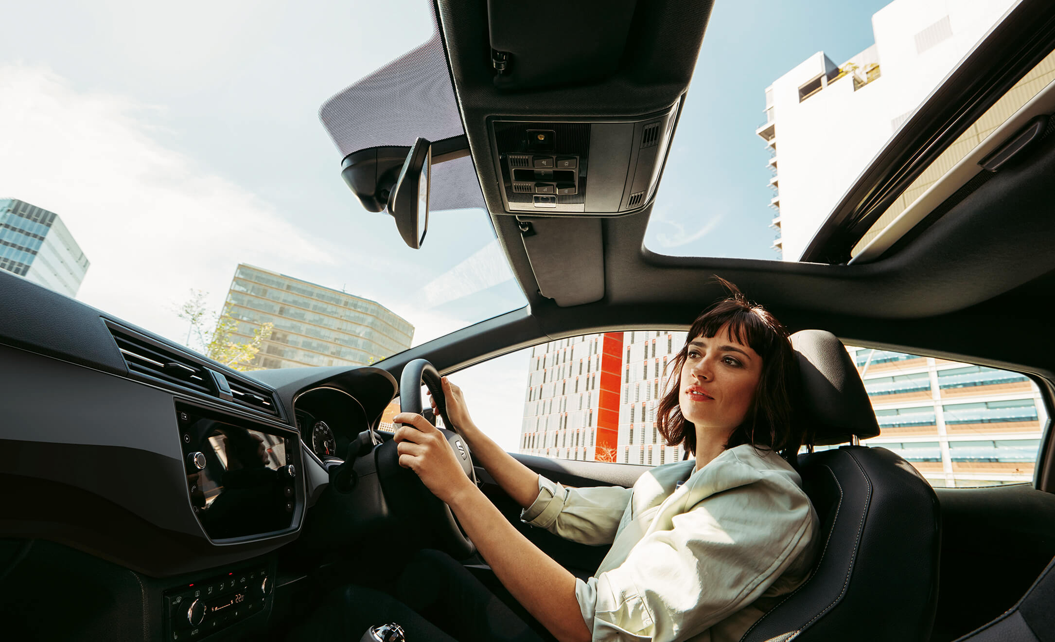 Woman driving her SEAT fleet vehicle